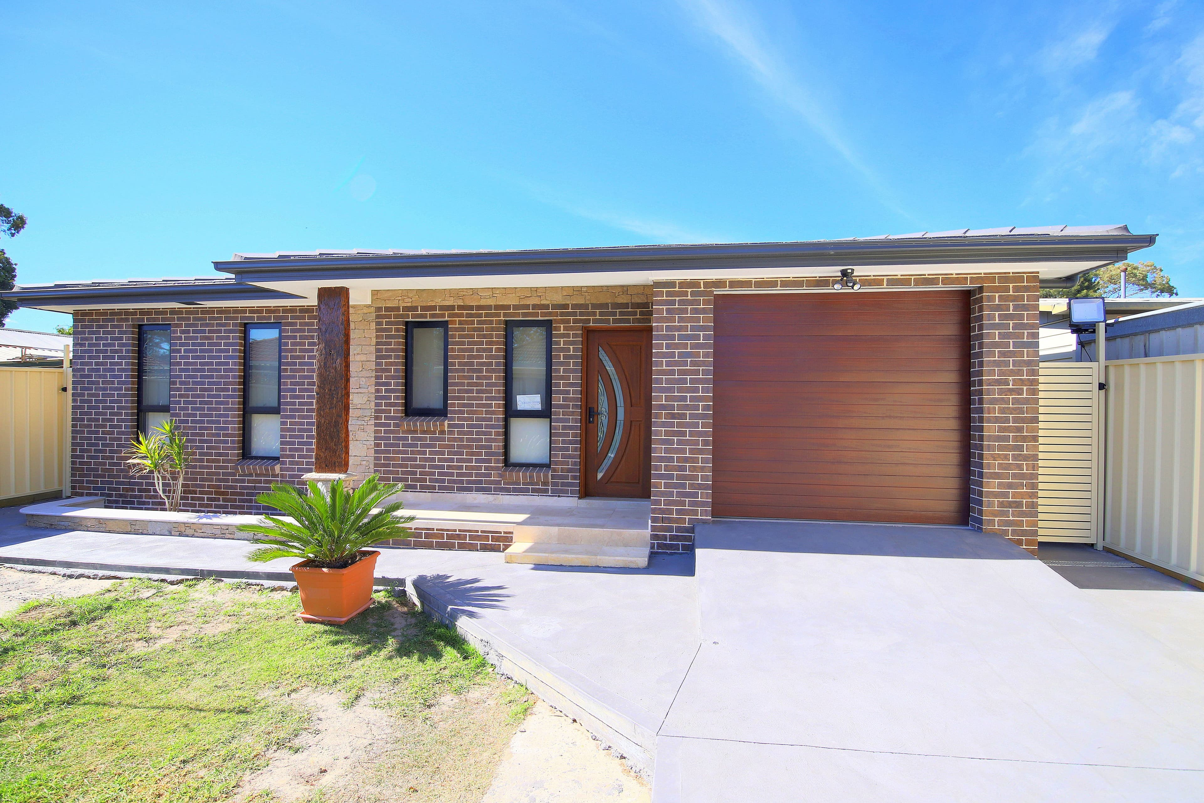 221 Henry Lawson Drive, Georges Hall NSW 2198, Georges Hall - Image 1